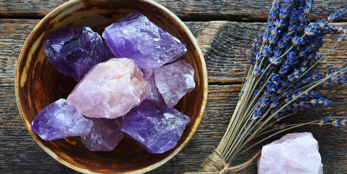 Organized display of 15 essential crystals for beginners categorized by protection, healing, manifestation groups