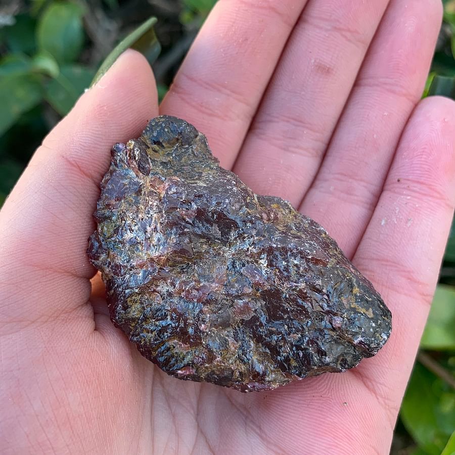 Stunning raw Garnet crystal on white background