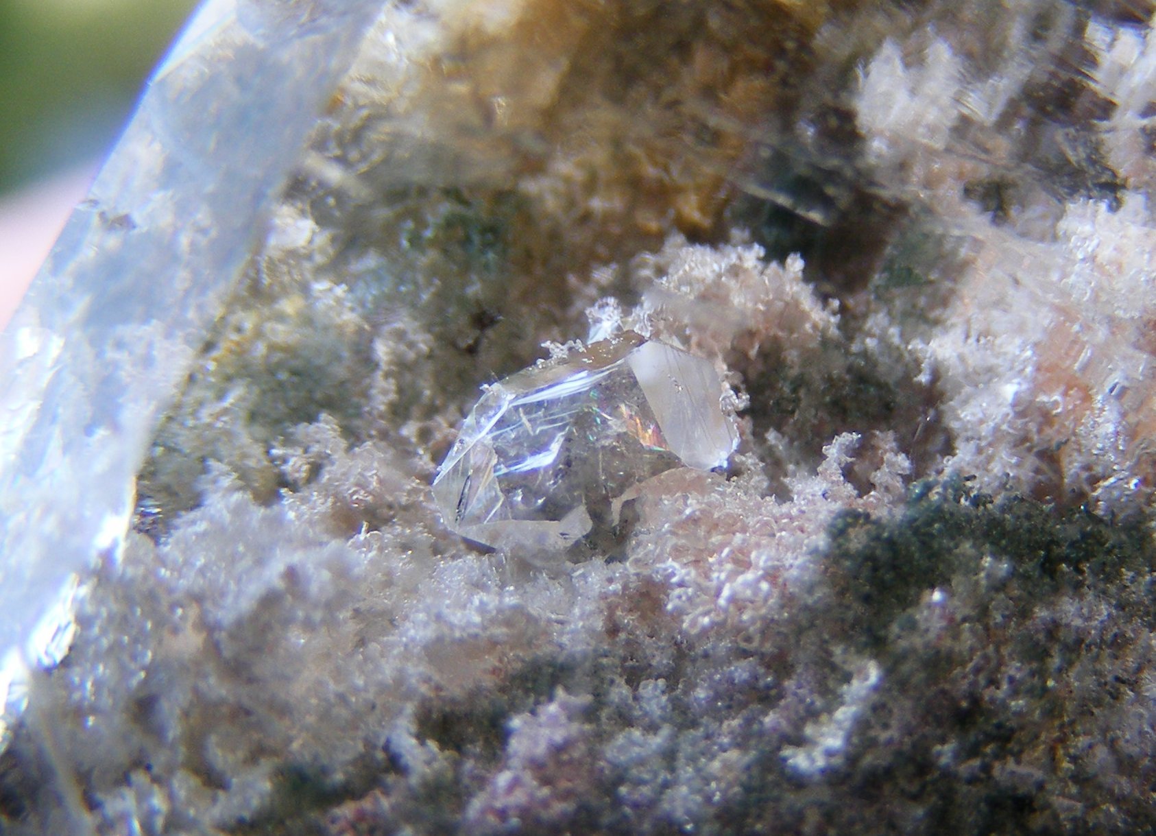 Close-up view of a quartz crystal displaying its hexagonal structure